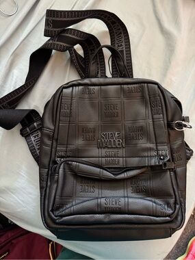 Steve Madden Black Embossed Logo Backpack